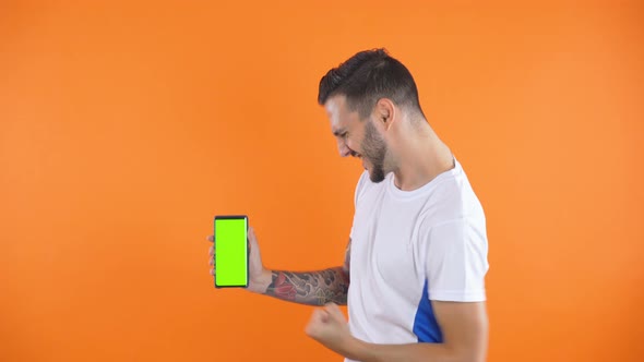 Football Fan with Green Screen Phone Victory, Happy and Goal Scream Emotions of Football Fan in Game