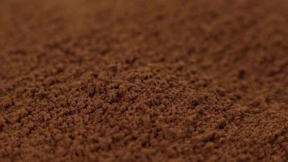 Instant coffee particles. Natural brown roast stimulant. Rotation