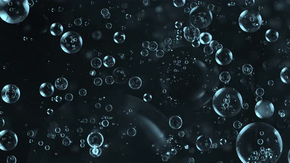 Super Slow Motion Shot of Moving Blue Bubbles Isolated on Black Background at 1000Fps