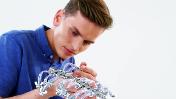 Computer engineer repairing computer motherboard