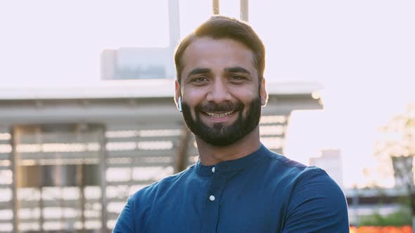 Smiling Bearded Indian Business Man Looking at Camera Outdoor Headshot Portrait