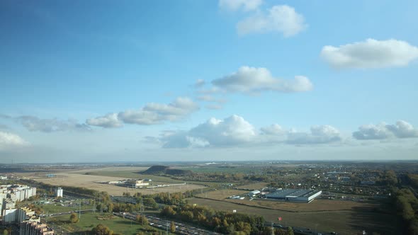 Flight over the autumn park. Trees with yellow autumn leaves are visible.