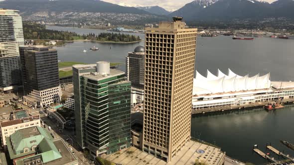 Aerial Time lapse of Vancouver harbour tower and Canada place on sunny day