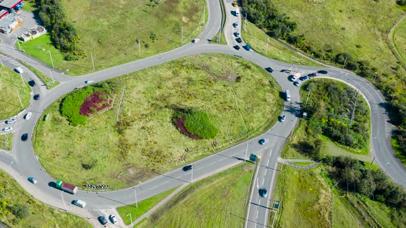 Aerial timelapse of a large traffic roundabout on a major British road