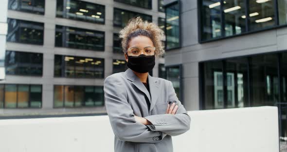 AfricanAmerican Businesswoman Looks at the Camera