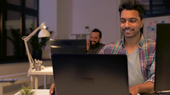 Indian Man with Computers Working at Night Office 82