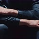 Closeup of Hands of Two Men Dressed in Prison Clothes - VideoHive Item for Sale