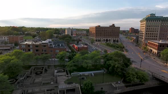 A drone flies over South Saginaw Street in Flint, Michigan approaching flying over the Vehicle City
