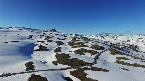 Flying above Aurlandsfjellet mountain road in Norway.