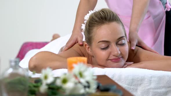 Woman Gets Back Massage Spa By Massage Therapist