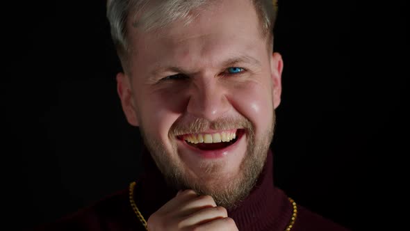 Smiling Stylish Young Man Looking at Camera Laughting at Loud After Funny Joke Feeling Happiness