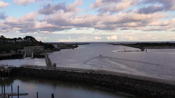 Commercial Crab boat leaves wharf out to open sea in Bandon, Oregon, USA.