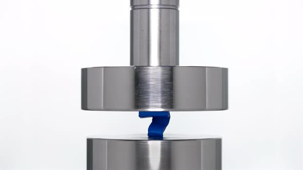 The Appearance of the Number Seven When Lifting the Rod From a Hydraulic Press on a White Background