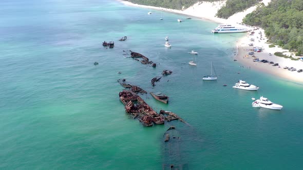 Aerial Flyover of Tangalooma Shipwrecks in Brisbane Australia in the Summer