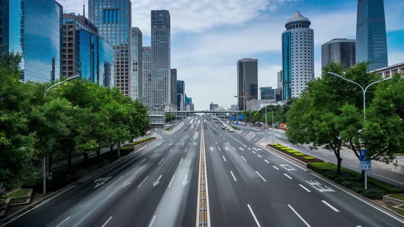 Time lapse of busy traffic and modern buildings in Beijing city , China.