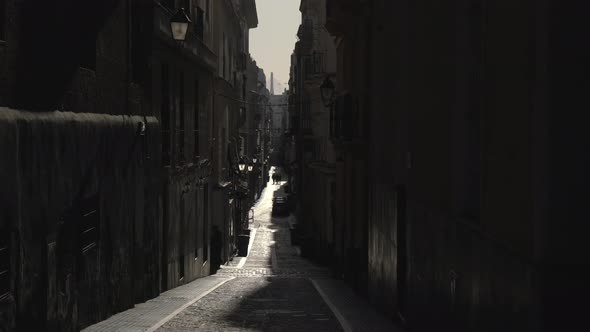 A narrow street with buildings