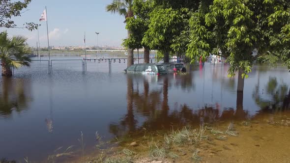 Cars Submerged in Floodwaters. Suitable for Showing the Devastation Wrought After Storms alt