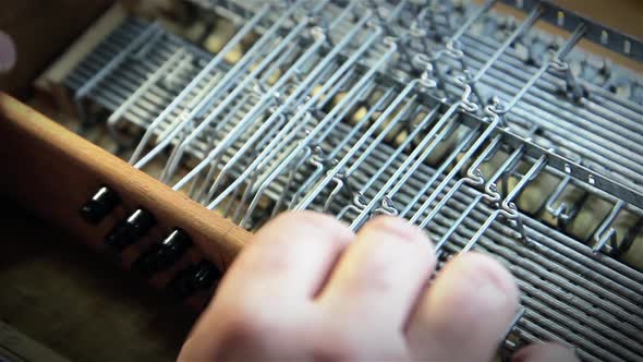 Inside an Accordion Bass Mechanism.