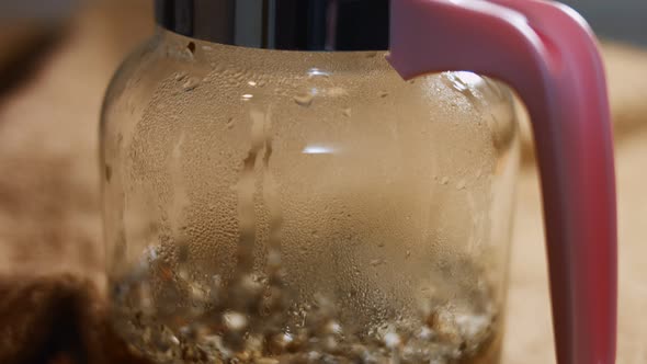 Closeup View of Aromatic and Relaxing Infusion of Tea From Sri Lanka in a Transparent Teapot