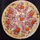 Top View of Whole Fresh Round Pizza with Tomatoes and Mozzarella Cheese Turns on a Table - VideoHive Item for Sale
