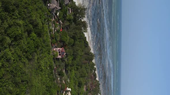 Vertical Video of Low Tide in the Ocean Near the Coast of Zanzibar Tanzania Aerial View