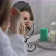 Young Woman Takes Care of Skin of Face - VideoHive Item for Sale