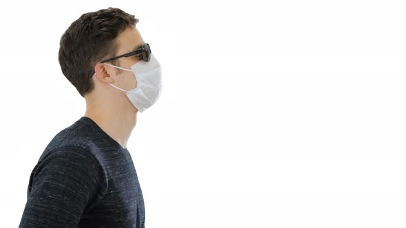 Blind Man in Black Glasses Walking on White Background.