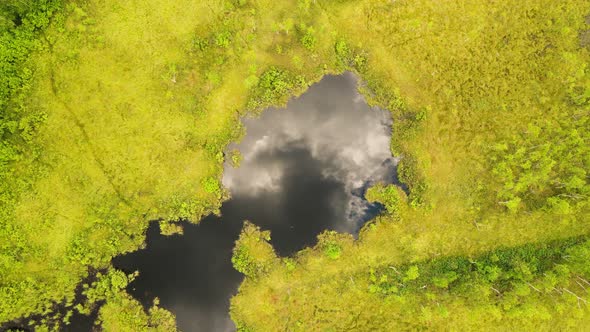 Beautiful Deep Karst Lake the Sky is Reflected in the Water