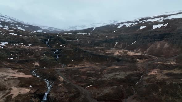 Aerial View Of Klifbrekkufossar Waterfall In East Iceland - drone shot