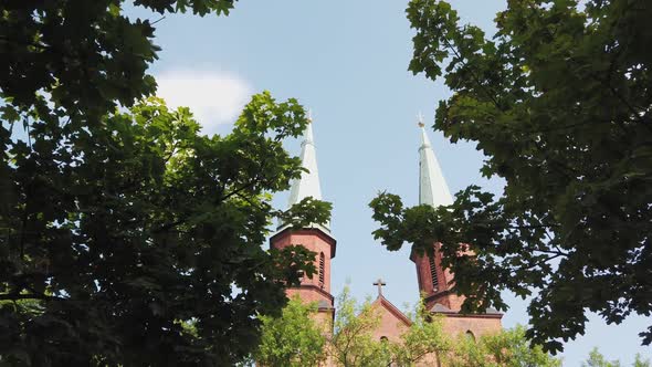 Two Large Domes of the Catholic Church with the Cross on Roof.