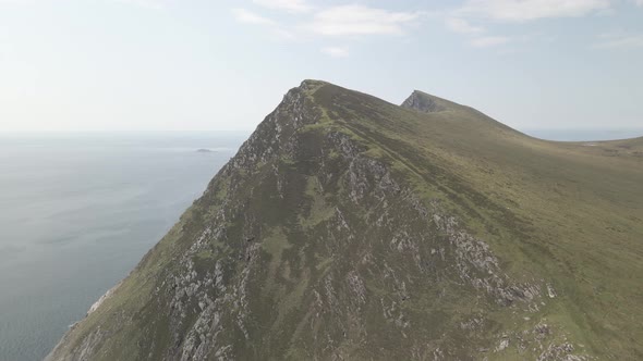 Towering Sea Cliffs Of Croaghaun On Achill Island In County Mayo, Ireland. Aerial Drone Shot