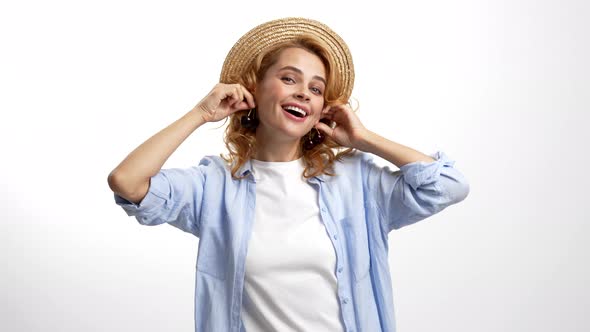 Smiling Woman in Straw Summer Hat with Earrings of Fresh Ripe Sweet Cherry Berry Summer Fashion