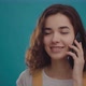 Happy Attractive Young Woman is Speaking on Smartphone - VideoHive Item for Sale