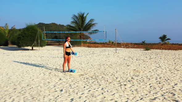 Girls tan on paradise tourist beach adventure by clear water and white sand background of Koh Phanga