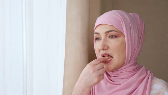 Young Muslim Woman Drinks Vitamin with Water