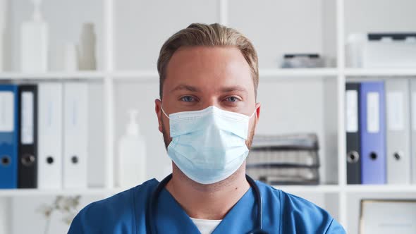 Professional medical doctor in hospital office, Portrait of young and confident physician.