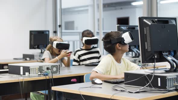 Multiethnic Kids Having Fun Using Virtual Reality Headset