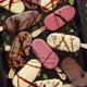 Set of Delicious White and Milk Chocolate and Strawberry Ice Cream on a Stick Served in Metal Tray - VideoHive Item for Sale