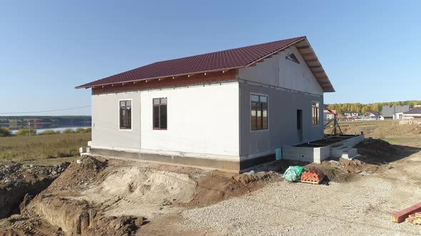 Drone view of facade of house of panels. 14