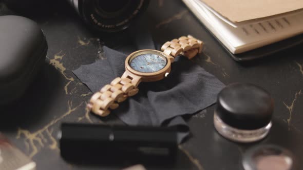 Luxurious Wood Watch For Women On Black Cloth On The Table. close up