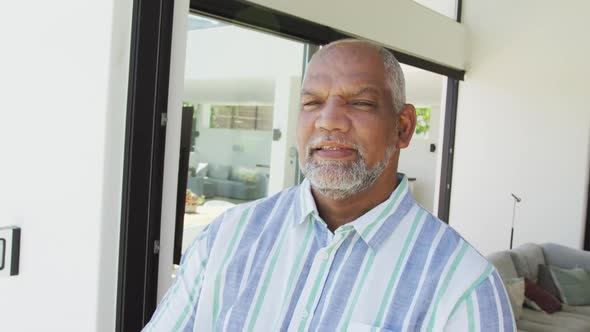 Portrait of happy senior african american man at retirement home