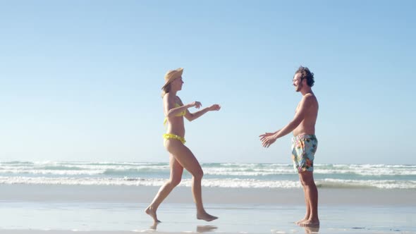 Couple having fun together at beach