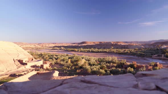 Revealing the desert valley and river under Ait Ben Haddou landmark in Morocco