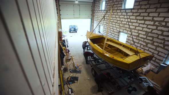 Wooden Boat in Garage Workroom