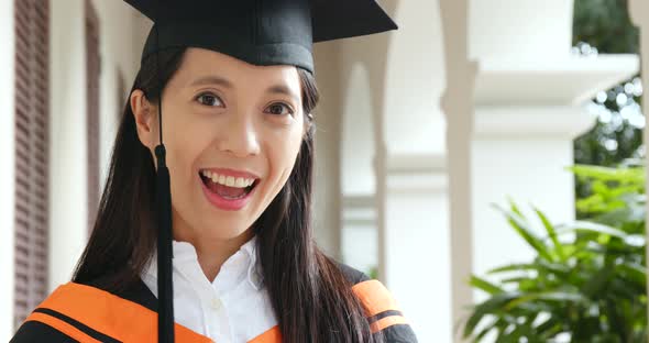 Young Woman Get Graduation in University Campus
