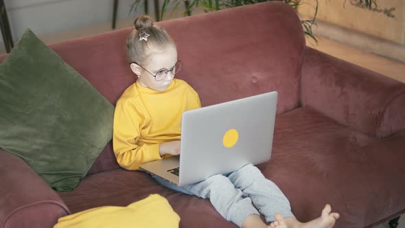 Little Girl With A Laptop