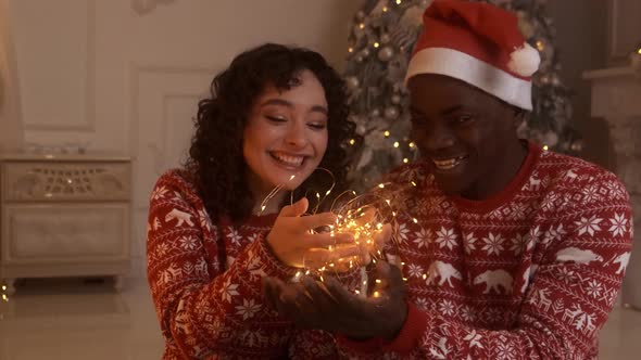 Happy Couple in Love Congratulates Each Other on New Year's Eve