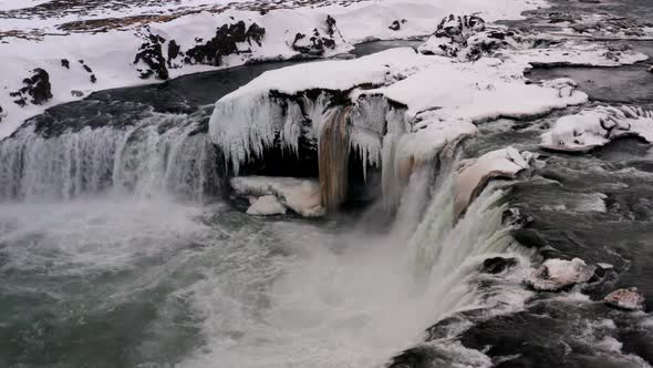 Aerial Orbit View of Goðafoss Waterfall in Winter, North Iceland, Touristic Destination Location Sur