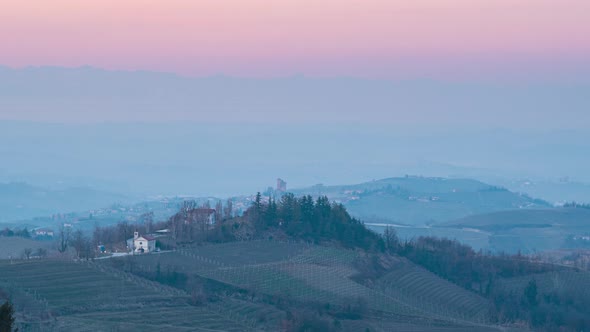 Time lapse: hill landscape at dusk Langhe wine yard region in Piedmont Italy