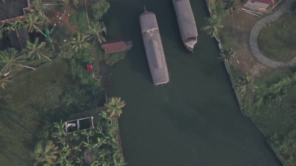 Boat trip to Kerala backwaters at Alleppey, India. Aerial top down drone view